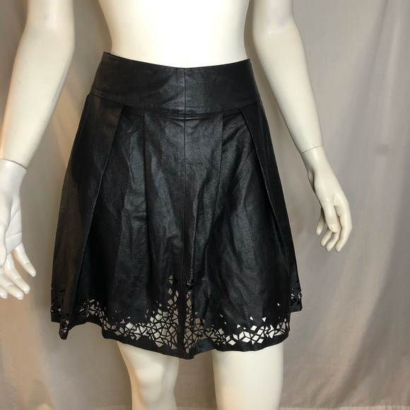 Woman’s black faux leather fit and flare skirt with cut out design size small - Picture 13 of 16